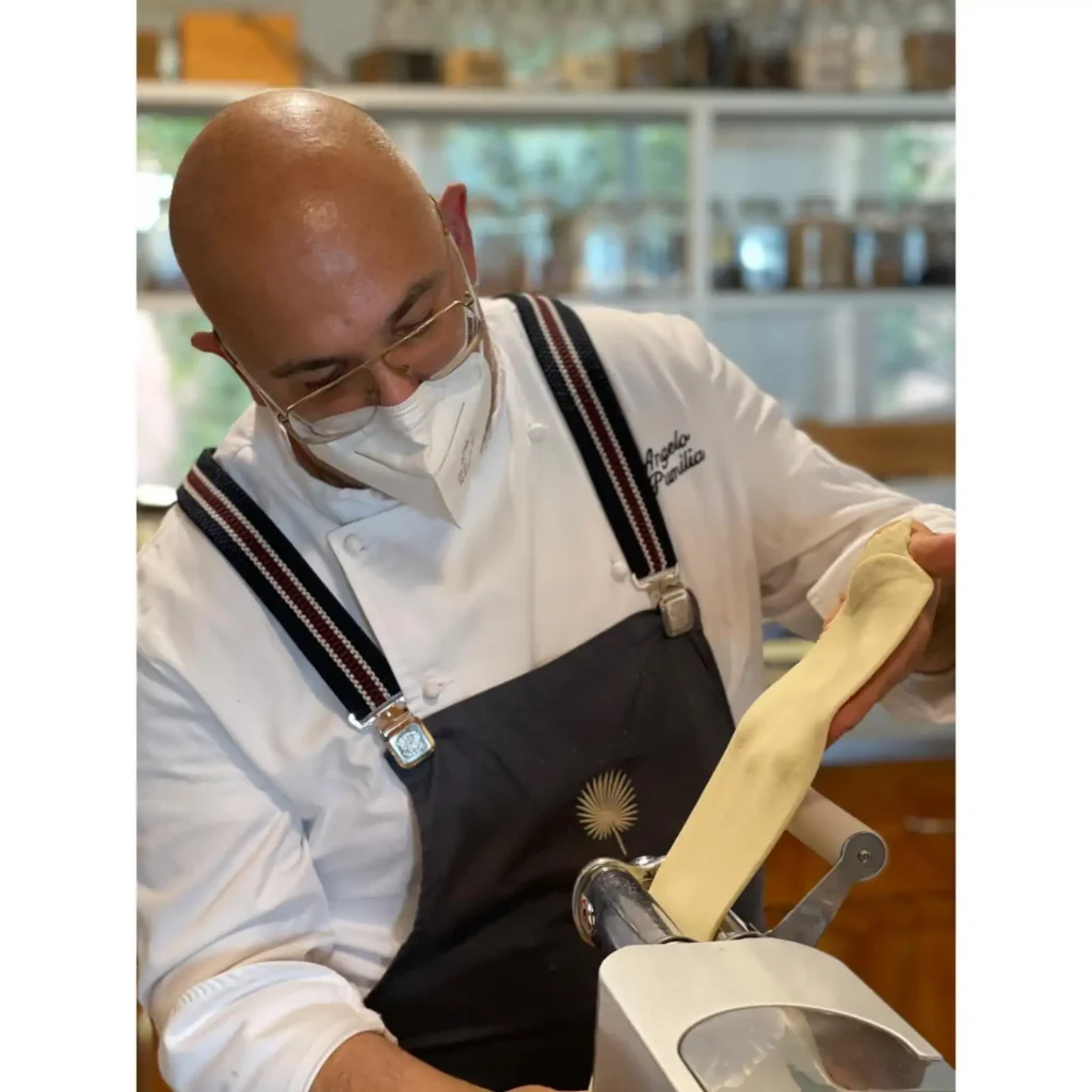 Sicily luxury yoga retreat Chef pressing fresh pasta made with local ingredients. Every dish is specially design for the participants