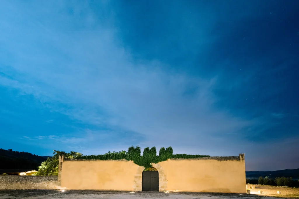 Sicily luxury yoga retreats Ulmo winery facade in the night with wide skies